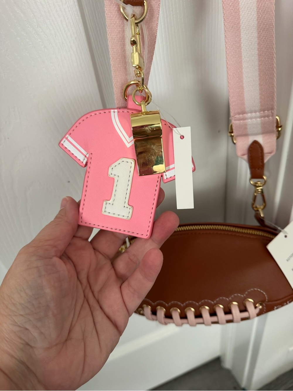 Brown Football-Shaped Crossbody Bag with Pink Striped Strap - Betsey Johnson - Picture 4 of 5